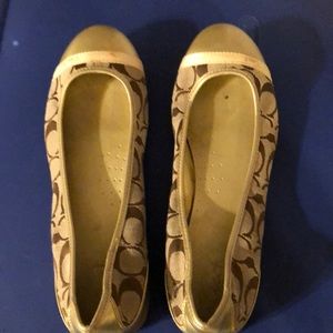 Gold and tan signature Coach loafer